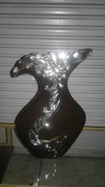 black and silver ornate vase