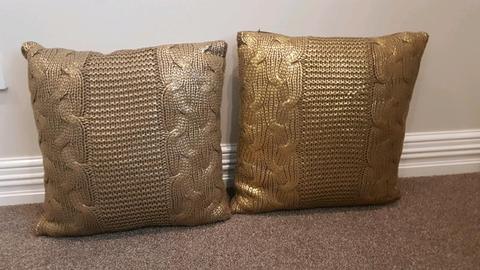 2 x Gold shimmer knitted cushions