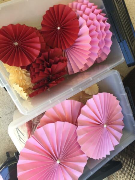 Decorating gorgeous pink paper fans