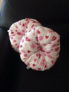 Two round pink love-heart/flower pillows - in excellent condition
