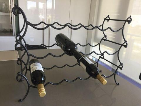 Black wrought iron wine rack -as new