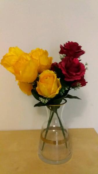 Artificial rose flowers and vase