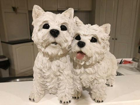 White twin pretty dogs statue