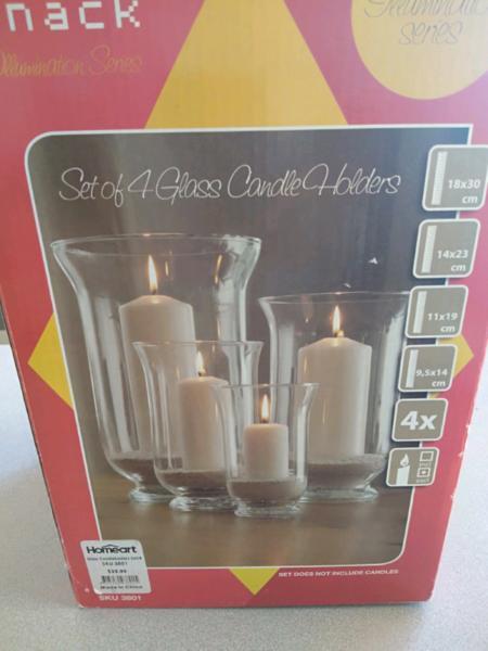 New set of glass candle holders