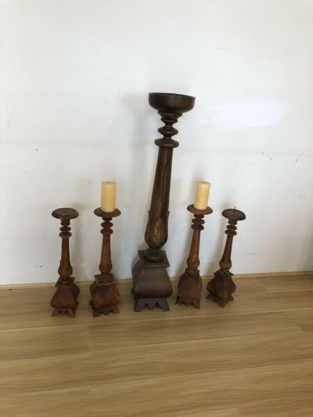 Carved set of five candelabra