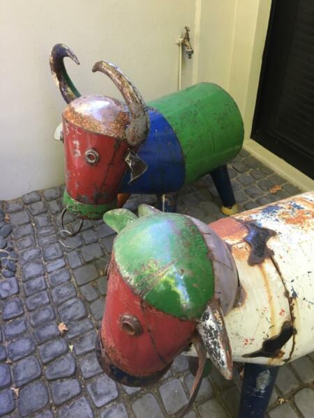 Recycled metal ornamental cows