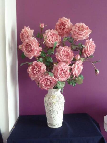 Vase with roses. Large display. Floral arrangement