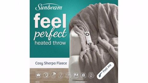 Sunbeam heated throw rug