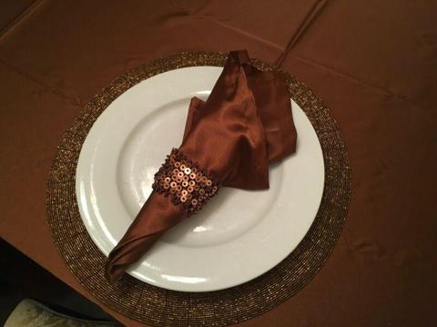 Coffee coloured tablecloth, 12 napkins & 12 beaded napkin rings