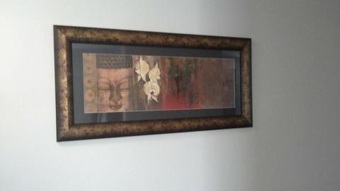 Buddha wall picture. Glass and gold/bronze frame. Looks new