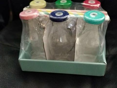 Mini milk bottles with straws