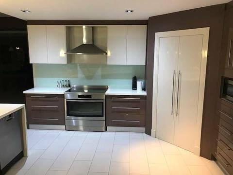 Second hand kitchen with Corian benchtop and rangehood