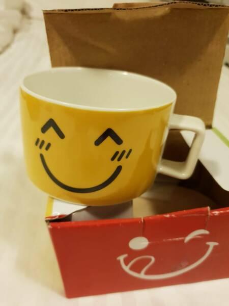 Yellow smiley face mug BRAND NEW IN ORIGINAL BOX