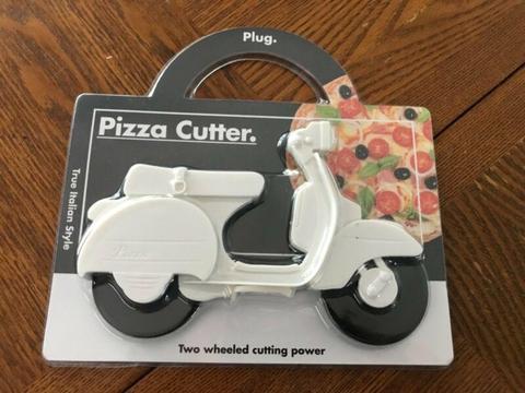Novelty pizza cutter. Brand new