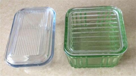 Two old glass containers