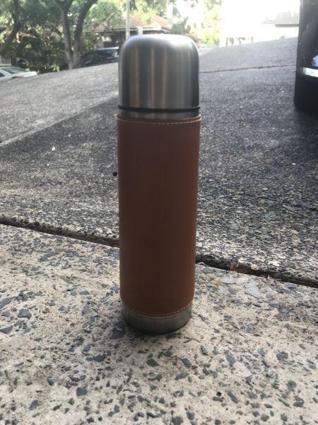 Thermos with tan leather case