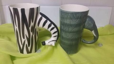Zebra elephant cat and rabbit coffee cups