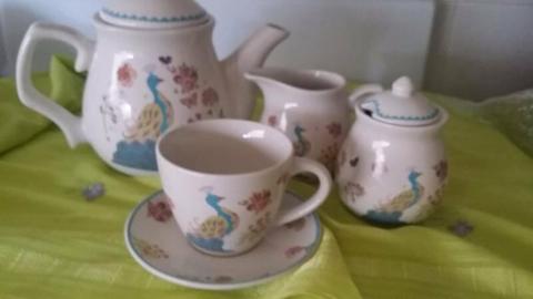 Teapot milk jug sugar bowl cup &saucer with peacock motif