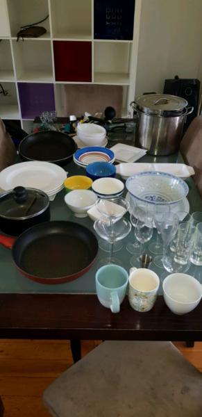Kitchen utensils pots pans plates glasses cutlery
