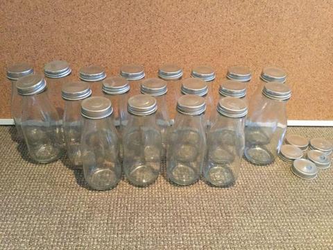 Bulk lot of milk bottle glass jars with metal lids