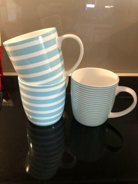 Light blue striped coffee cups