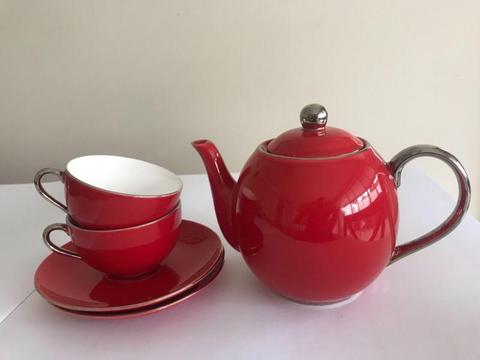 Christiana Red Teapot and two tea cups and saucers gold trim