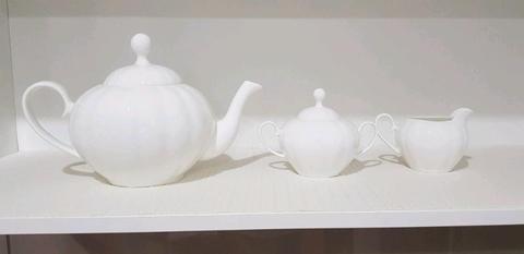 Teapot, creamer and sugar bowl