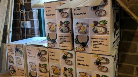Five boxes of dinnerware