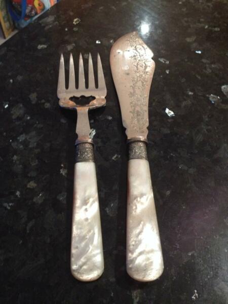 Large silver fish knife and fork