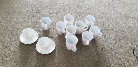 Assortment of plane white cups