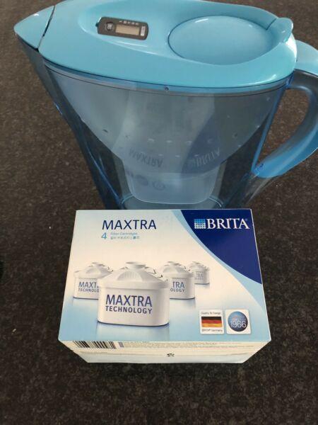Brita maxtra filter cartridges x 4 and Marella blue filter jug