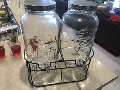 Glass jugs with taps