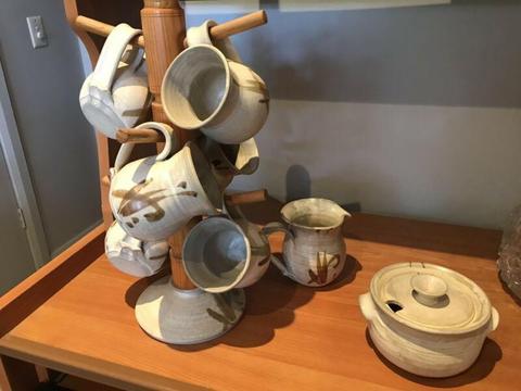 Pottery mugs, milk server and sugar pot