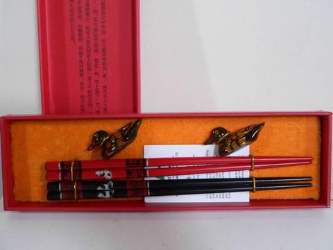 Chinese chopsticks with pandas and ducks in presentation pack