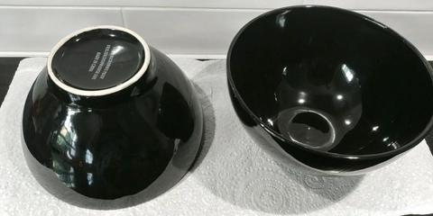 2 large ceramic black bowls