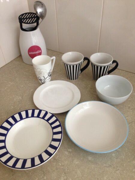Assorted crockery plates kitchen cups mugs