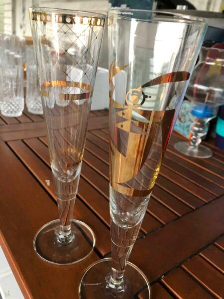 Gold decorated champagne glasses