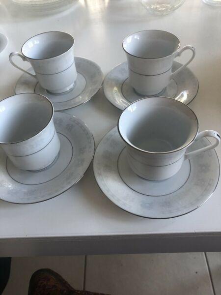 4 teacups and saucers