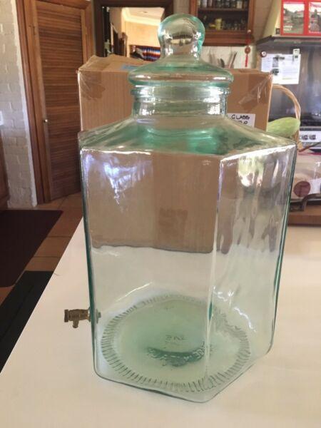 Large glass beverage container with tap