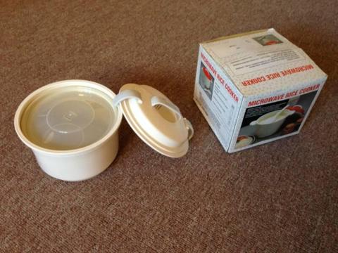 Microwave Rice Cooker. NEW. Capacity:3 Cups. Price:$20