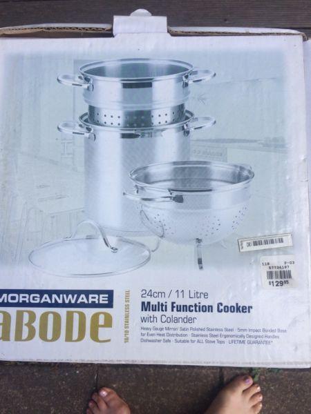 Multi function cooker with colander