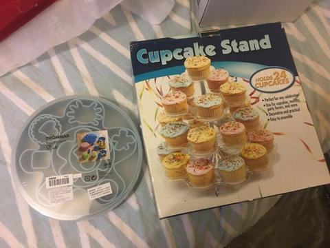 Cup cake stand and cake shape moulds both in excellent condition