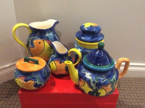 Colourful hand painted pottery tea set purchased from a Gallery