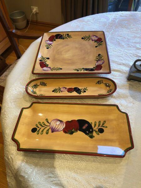 Set of four plates