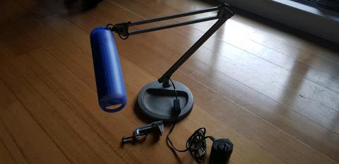 Lamp on articulated arm with solid base & clamp