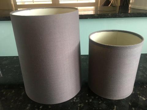 Two matching grey freedom lamp shades