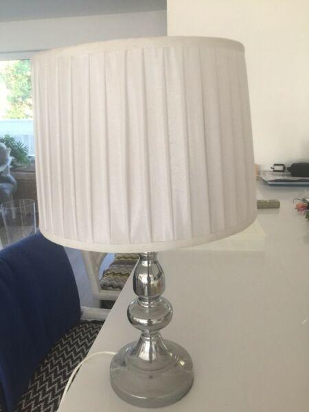 Chrome bedside lamp with white shade