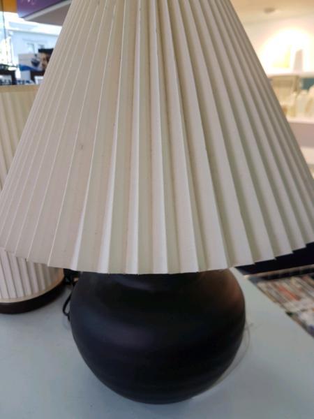 Lamp with white lampshade brown base