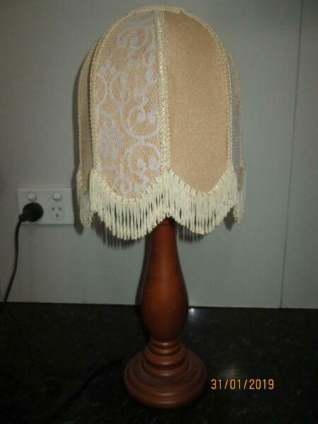 gorgeous lamp . solid wood base with pretty shade