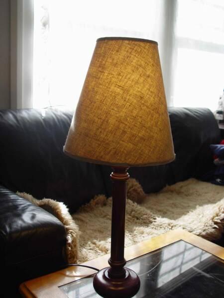 Brand new wooden base bedside table lamp with beige fabric shade